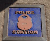 antique plaque out the front of Morpeth Police Station